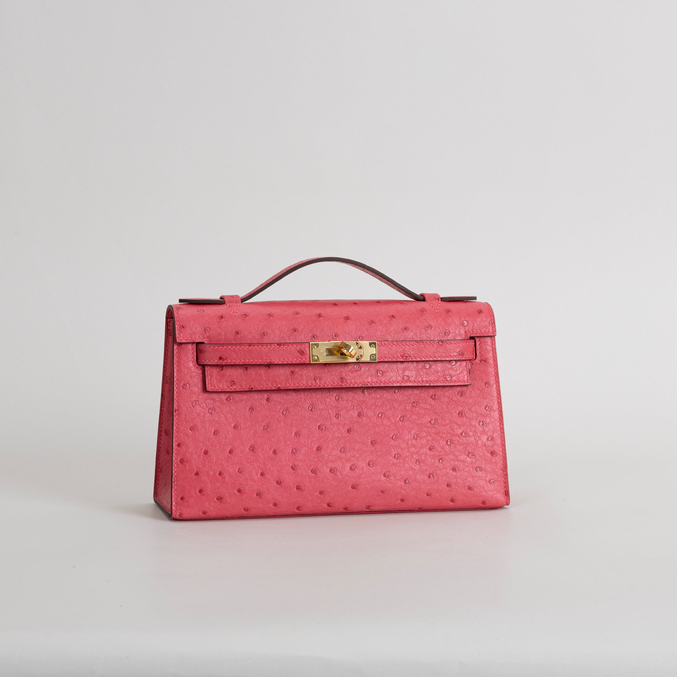 KELLY POCHETTE OSTRICH LEATHER ROSE TYRIEN WITH GOLD HARDWARE (GHW)