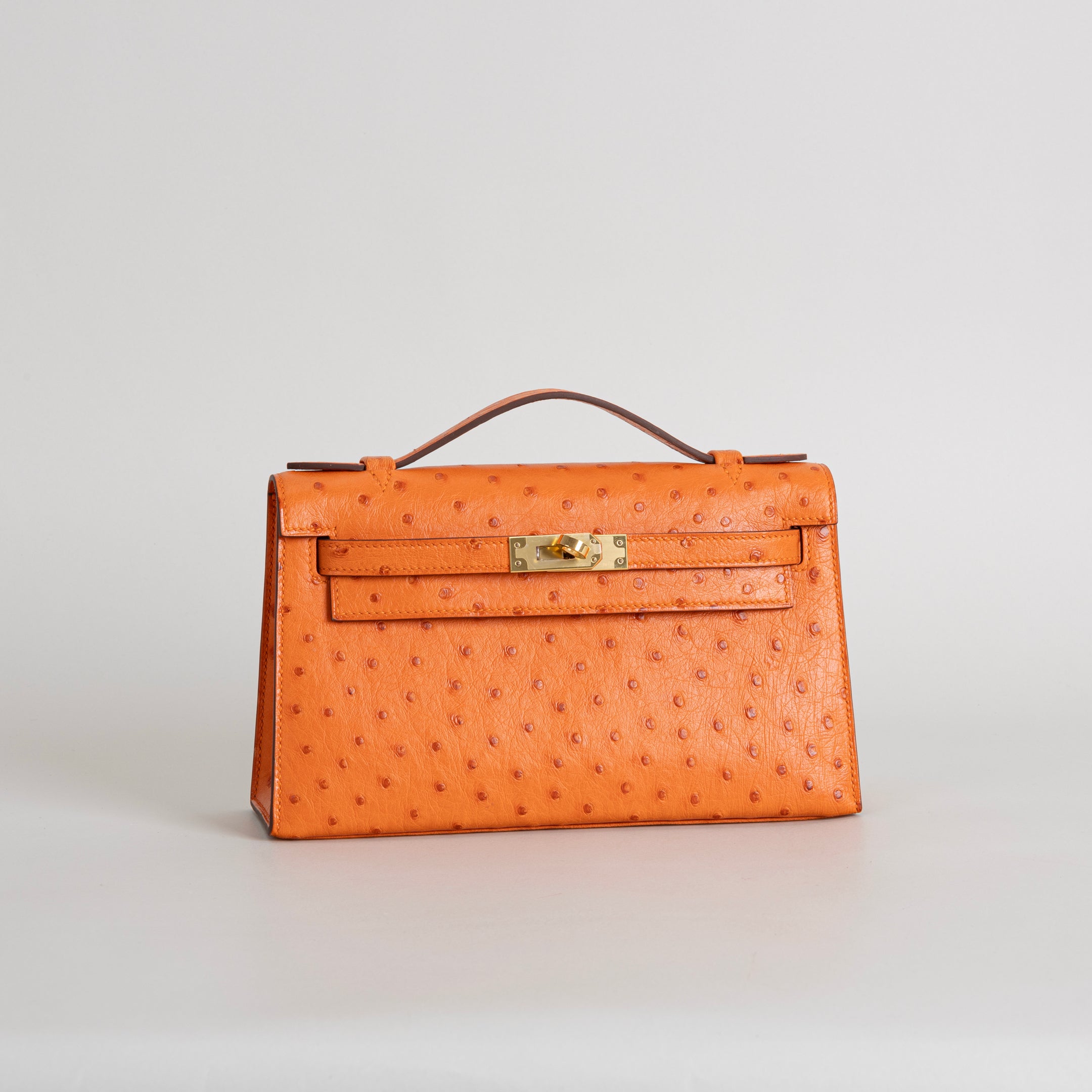 KELLY POCHETTE OSTRICH LEATHER ORANGE WITH GOLD HARDWARE (GHW)