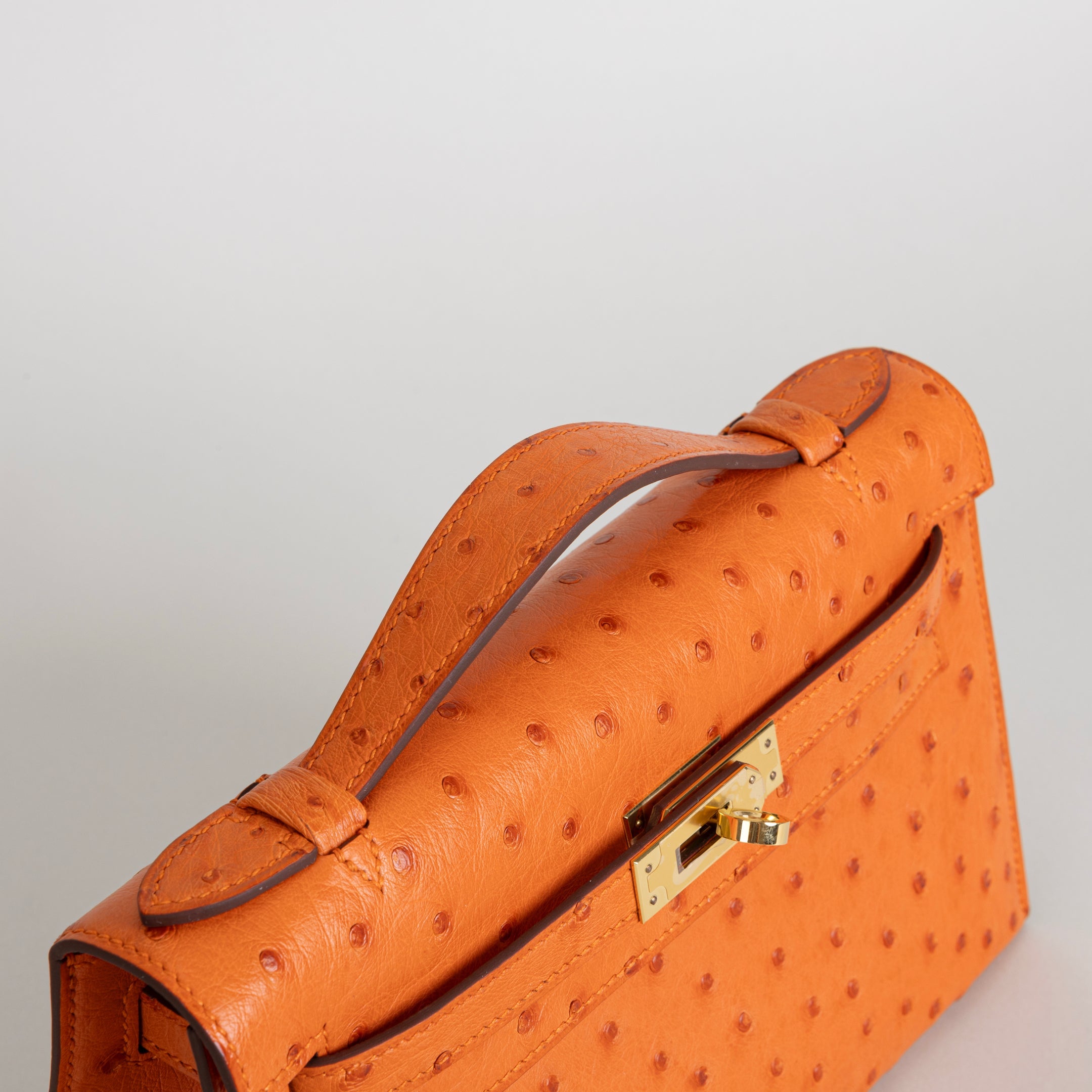 KELLY POCHETTE OSTRICH LEATHER ORANGE WITH GOLD HARDWARE (GHW)