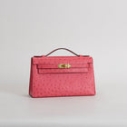 KELLY POCHETTE OSTRICH LEATHER ROSE TYRIEN WITH GOLD HARDWARE (GHW)