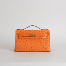 KELLY POCHETTE OSTRICH LEATHER ORANGE WITH GOLD HARDWARE (GHW)