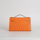 KELLY POCHETTE OSTRICH LEATHER ORANGE WITH GOLD HARDWARE (GHW)